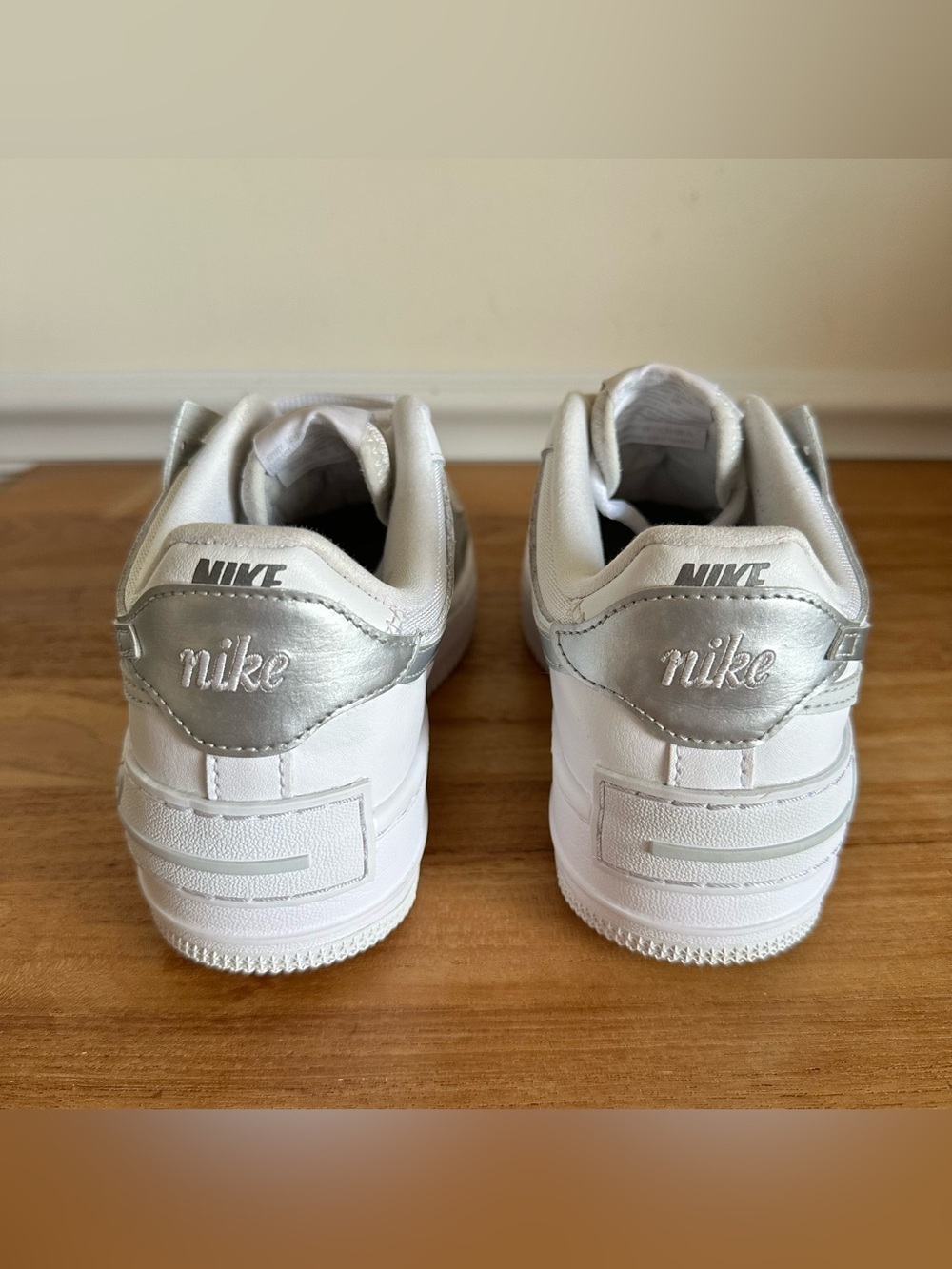 Nike White Sneakers with Metallic Silver Swoosh - Picture 7 of 11